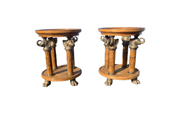 Pair of round dining room table pedestal with elephant heads and feets.