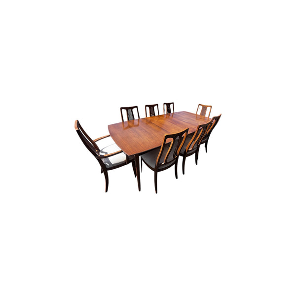 The Halle Bros Mid Century Modern Walnut Cane Back Dining Room Set 8 chairs