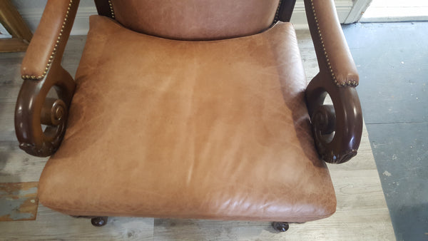 Pair of Victorian style leather armchairs